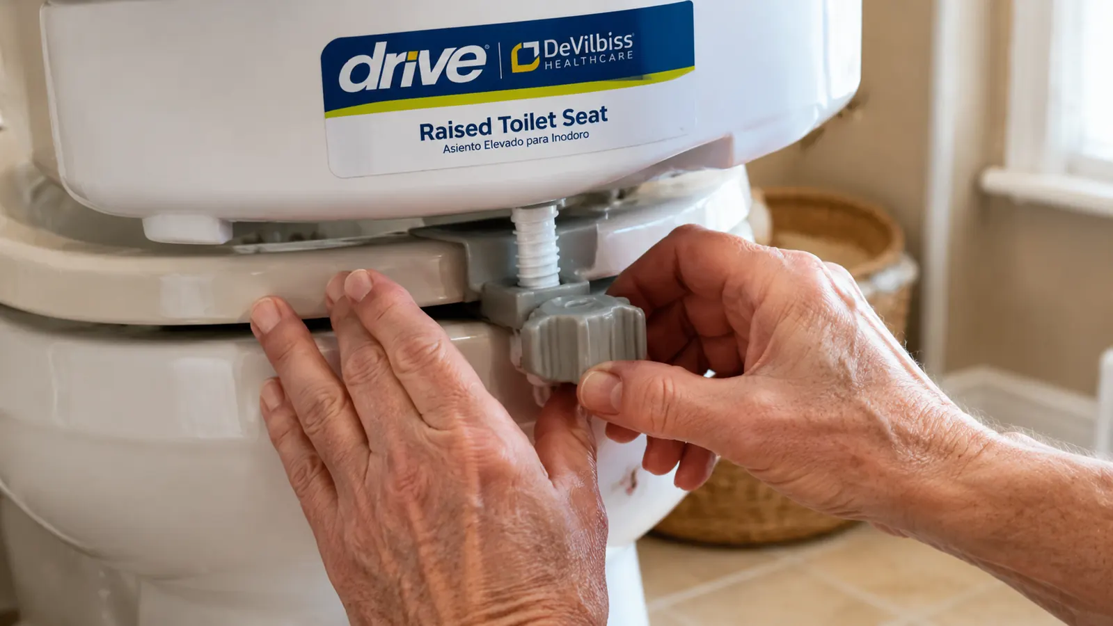 Hands tightening the locking bracket under the rim of a raised toilet seat